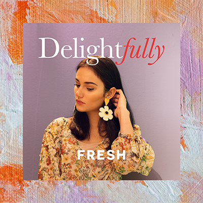Delightfully Fresh girl showing earrings